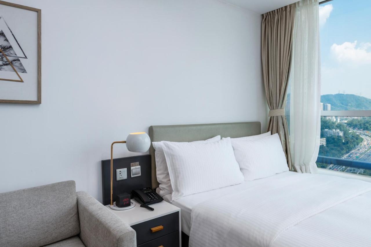 שנג'ן Golden Central Hotel Serviced Residence-Xin Hao E Du מראה חיצוני תמונה