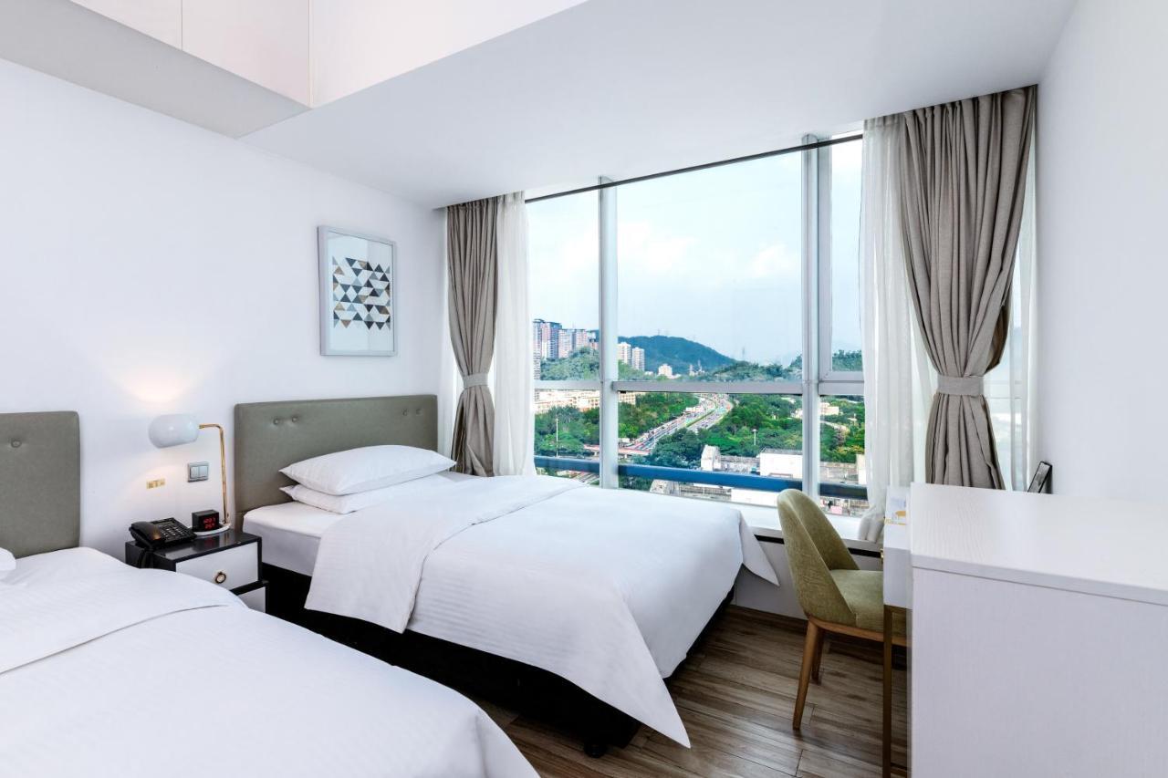 שנג'ן Golden Central Hotel Serviced Residence-Xin Hao E Du מראה חיצוני תמונה